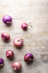 Shallot onions in a group on wood,still life