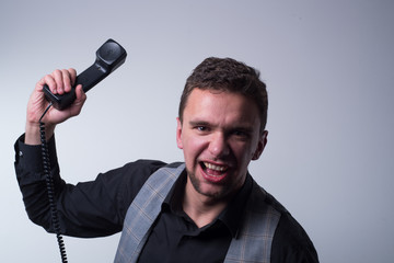 Naklejka premium angry man with phone