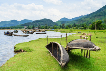 Two boats in Tam Giang - Cau Hai lagoon, Hue, Vietnam. This lagoon system spans over 70km, making it the largest in all of Southeast Asia. The brackish coastal lagoon is fed by four different rivers. © tranquocphongvn