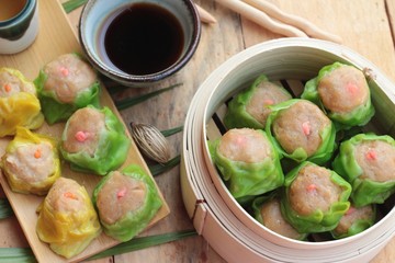 Chinese steamed dumpling and hot tea delicious.