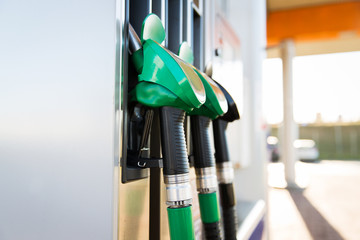 close up of gasoline hose at gas station