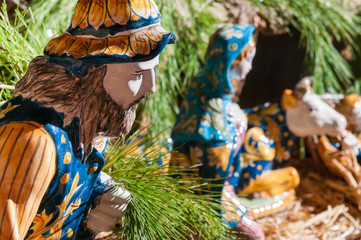 Obraz na płótnie Canvas Painted pottery statue of shepherd in the ceramic nativity scene of an artisan in Caltagirone