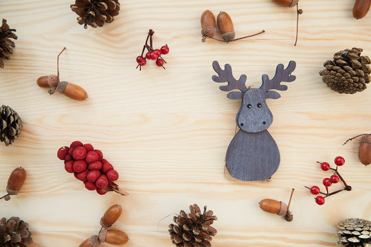 Christmas Frame: Cones, Cinnamon, Berries, Acorn On The Wood Table