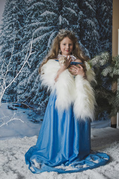 Charming child is holding a ferret 4560.