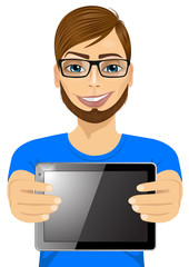 young hipster man displaying tablet