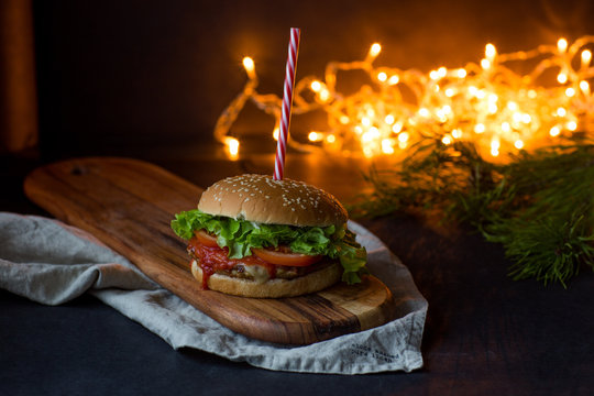 hamburger, Christmas concept, bokeh, dark photo, selective focus