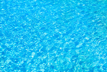 swimming pool with sunny reflections