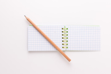 the notepad with pencil