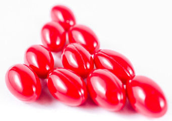 red pill capsule medicine isolated on white background