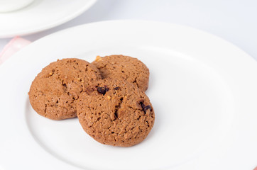 Chocolate cookie biscuits on dish