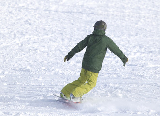Fototapeta na wymiar people snowboarding on the snow
