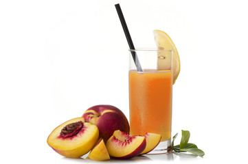 Glass of peach juice isolated on white