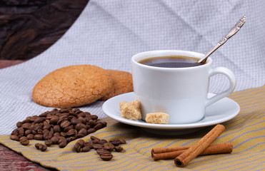 Black coffee, cinnamon and cookies