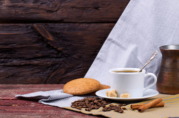 Black coffee, cinnamon and cookies