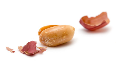 Peanuts on a white background. close