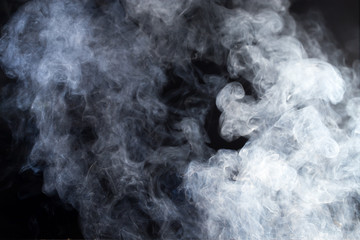 Smoke fragments on a black background