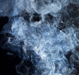 Smoke fragments on a black background