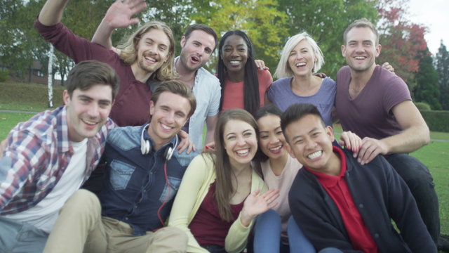  Happy close friends together outdoors Could be student group or young Christians