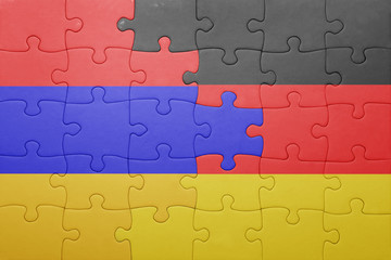 Fototapeta premium puzzle with the national flag of armenia and germany