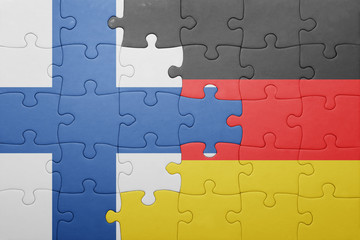 puzzle with the national flag of finland and germany