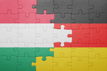 Fototapeta premium puzzle with the national flag of hungary and germany
