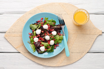 Fototapeta na wymiar Green salad on plate