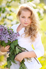 portrait of little girl outdoors in summer