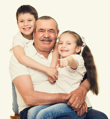 Grandfather and grandchildren portrait