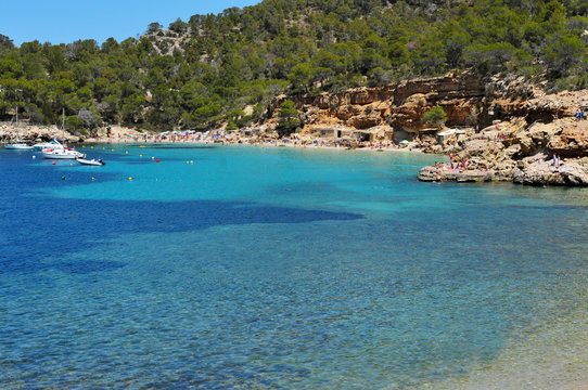 Cala Salada beach in San Antonio, in Ibiza Island, Spain - the beach at the beach in the south of fr