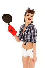 Young woman with frying pan.