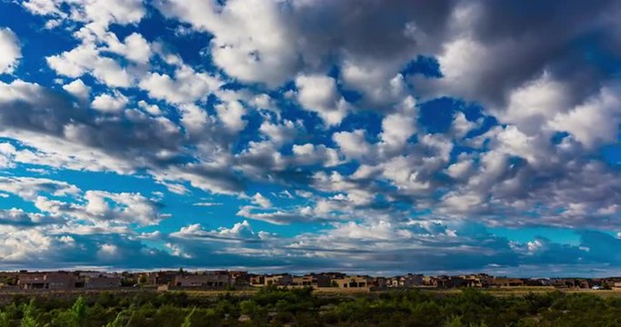 Residential Time Lapse in Western City. a cloud covering time lapse of residential city of Las Cruces in New Mexico during daytime.
