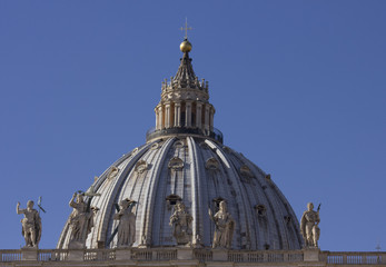 Fototapeta na wymiar Architectural close up of the Dome of Saint Peter Basilica in Vatican City, Rome