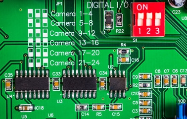 Close up of a printed green computer circuit board