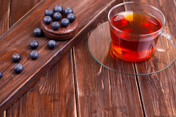 Fruit tea with cake blueberry berries