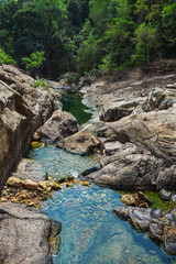 Fototapeta na wymiar Waterfall on the island of Koh Chang in