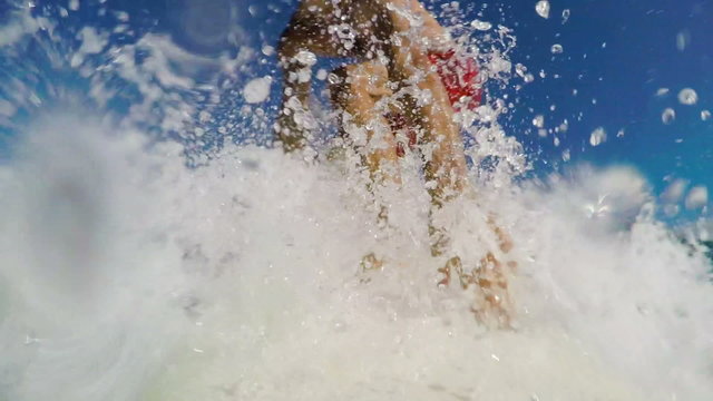 Surfer on Blue Ocean Wave Surfing Getting Barreled. POV GOPRO SELFIE