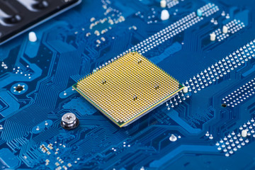 blue circuit board background of computer motherboard