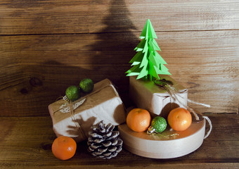 Christmas gifts and toys on the wooden background