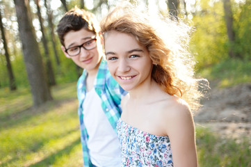 Portrait of a boy and girl  in summer