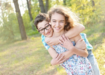 Portrait of a boy and girl  in summer