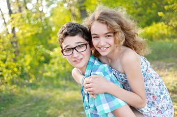 Portrait of a boy and girl  in summer