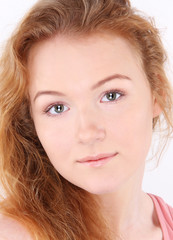 Naklejka premium Portrait of happy cheerful smiling young beautiful woman