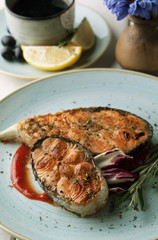 Grilled salmon on a plate with sauce