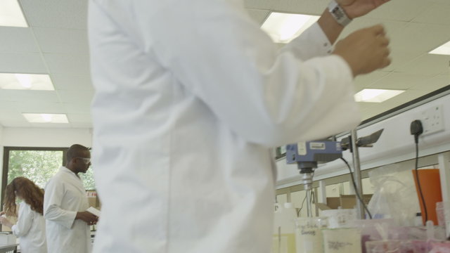  Science Lab and scientists working on cosmetics, medicines and food analysis