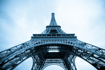 Fototapeta na wymiar Low angle color toned view of Eiffel Tower
