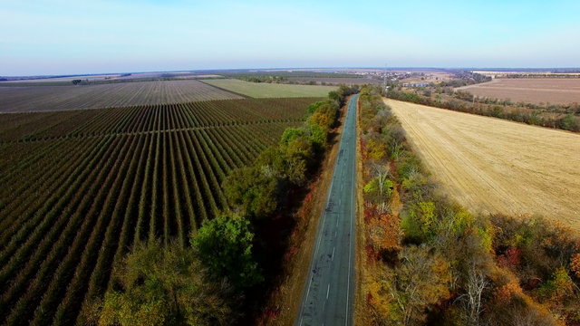 Flying Over a Highway in Autumn. Videography Quadrocopters