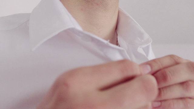 The groom wears a shirt.NTSC.