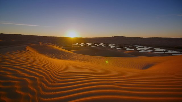 Sahara Desert landscape, wonderful dunes early in the morning. Time-laps.