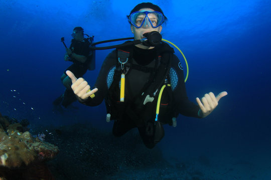 Young female scuba diver