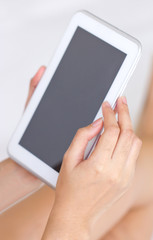 Young Asian Woman Holding A Tablet.